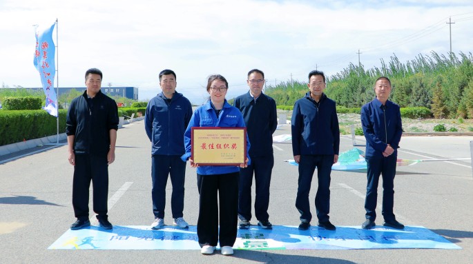 新能源公司組織職工參加武威涼州工業(yè)園區(qū)“匠心向黨 步履不?！甭毠そ〔阶呋顒?dòng)